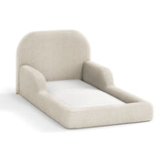 Beige pet bed with white cushion on a white background